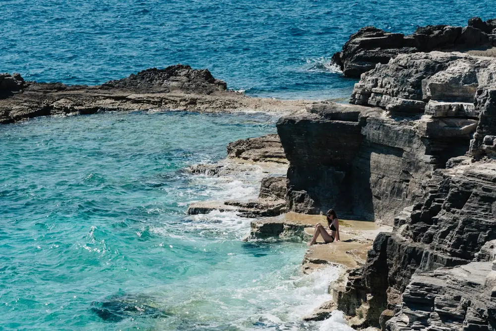 Turquoise water at a rocky swimming cove on the Istrian coast, Croatia