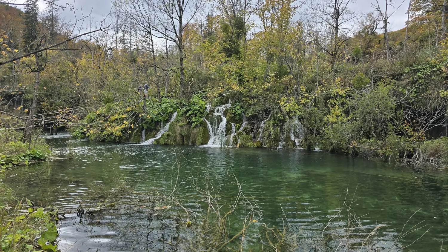 Several interconnected lakes with travertine cascades in Plitvice Lakes National Park, Croatia
