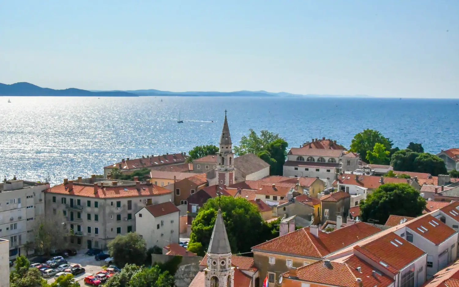The old town of Zadar on its peninsula with the sea and offshore islands beyond, Croatia